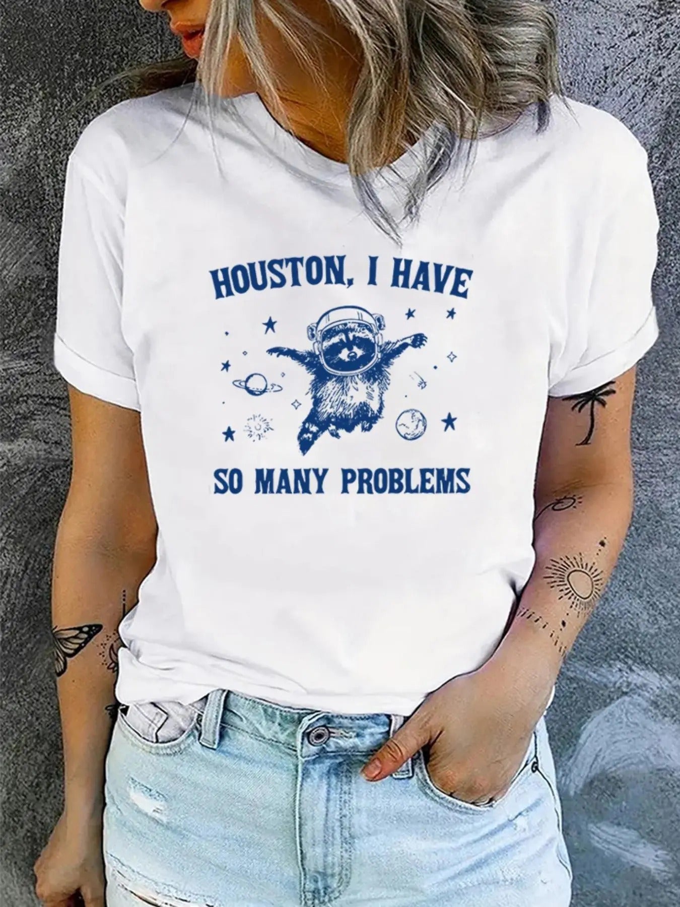 Women'WB shield Cartoon Raccoon & Letter Print Round Neck Tee, Casual Crew Neck T-shirt for Daily Holiday Vacation...