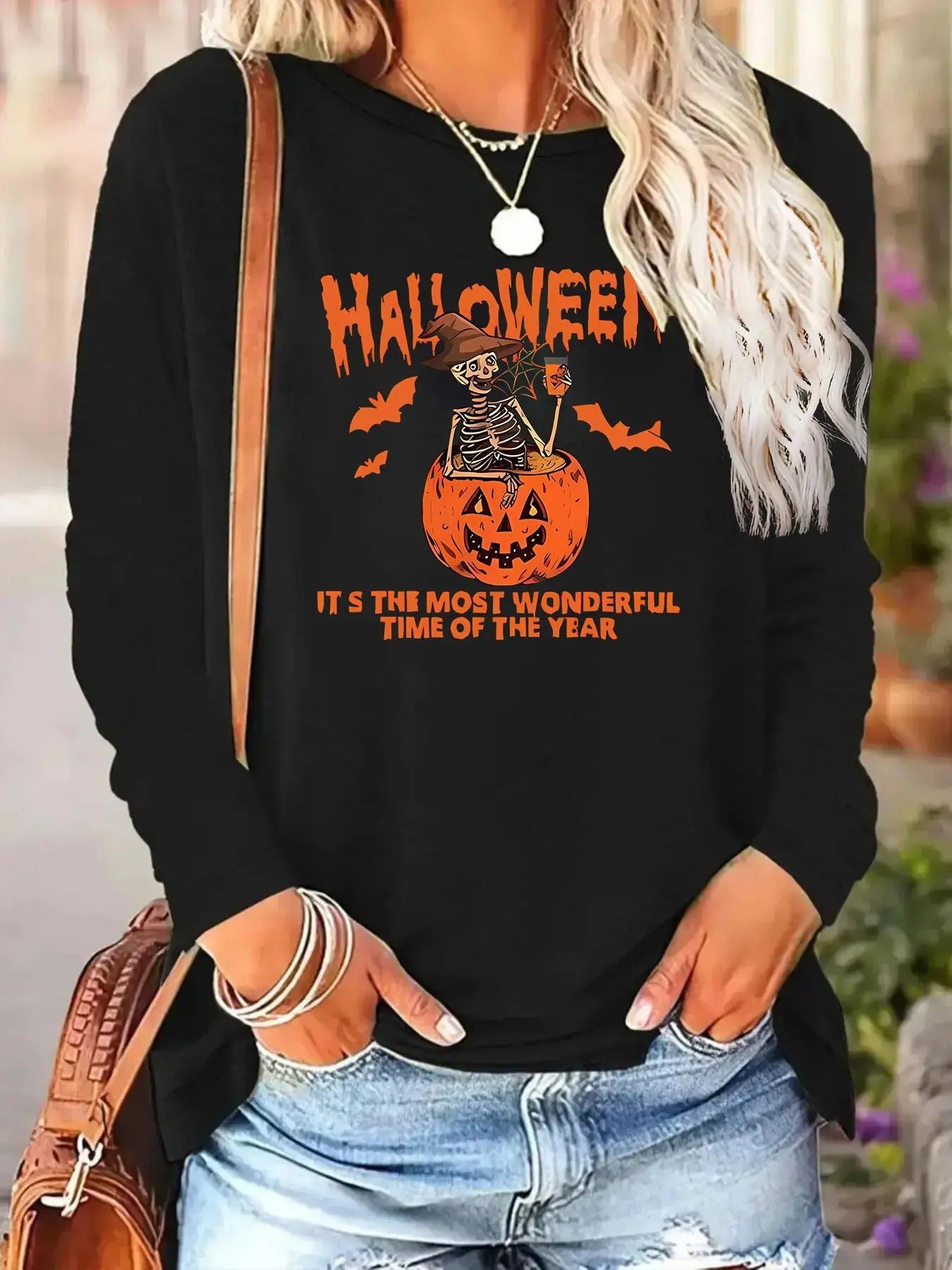 Women'WB shield Cartoon Skeleton & Pumpkin Print Round Neck Tee, Halloween TNF Fashion Casual Long Sleeve T-shirt,...