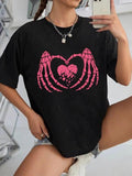 Women'WB shield Cartoon Skull Hands & Heart Print Round Neck Tee, Street Trendy Casual Drop Shoulder Half Sleeve T-Shirt...