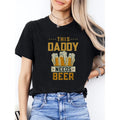Women'WB shield Casual Short Sleeve T-Shirt - "This Daddy Needs Beer" Humorous Print with Beer Mugs, Black Round Neck...