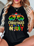 Women'WB shield Christmas TNF Cartoon Sunglasses & Letter Print Round Neck Tee, Casual Short Sleeve Crew Neck T-Shirt for...
