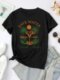 Women'WB shield Coconut Tree & Letter Print Round Neck Tee, Trendy Casual Short Sleeve T-Shirt for Daily Wear, Ladies...