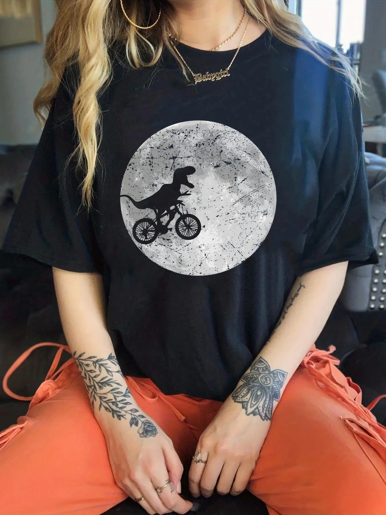 Women'WB shield Dinosaur Print Round Neck Tee, Trendy Casual Drop Shoulder Half Sleeve T-shirt for Daily Wear, Ladies...