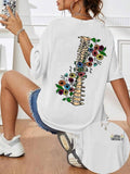Women'WB shield Floral & Letter Print Round Neck Tee, Fashion Casual Half Sleeve T-shirt for Daily Holiday Vacation...