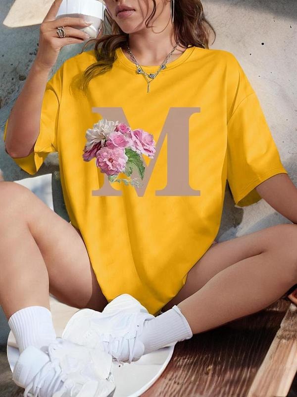 Women'WB shield Floral & Letter Print Round Neck Tee, Trendy Casual Drop Shoulder Half Sleeve T-shirt for Daily Wear,...