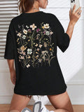 Women'WB shield Floral Print Drop Shoulder Graphic Tee, Casual Cute Half Sleeve Round Neck T-Shirt for Daily Wear, Ladies...