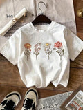 Women'WB shield Floral Print Round Neck Tee, Fashion Casual Short Sleeve T-Shirt, Ladies Summer TNF for Daily Wear style...