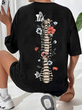 Women'WB shield Graphic Drop Shoulder Tee, Fashion Skeleton & Floral Print Half Sleeve T-shirt, Chic Summer Tee Shirts,...