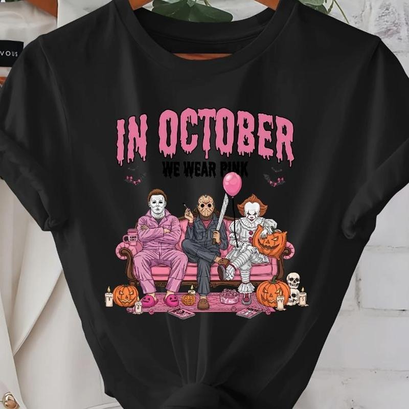 Women'WB shield Halloween Graphic T-Shirt Red plumber brand October We Wear Pink Lettering with Ghosts Pumpkins Candy...