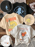 Women'WB shield Lemon & Cocktail & Slogan Print Round Neck Tee, Casual Fruit Graphic Short Sleeve T-shirt for Summer,...