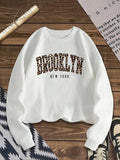 Women'WB shield Leopard Letter Print Drop Shoulder Sweatshirt, Casual Long Sleeve Round Neck Pullover for Fall & Winter,...
