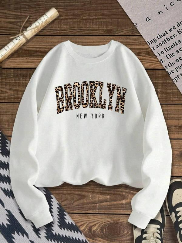 Women'WB shield Leopard Letter Print Drop Shoulder Sweatshirt, Casual Long Sleeve Round Neck Pullover for Fall & Winter,...