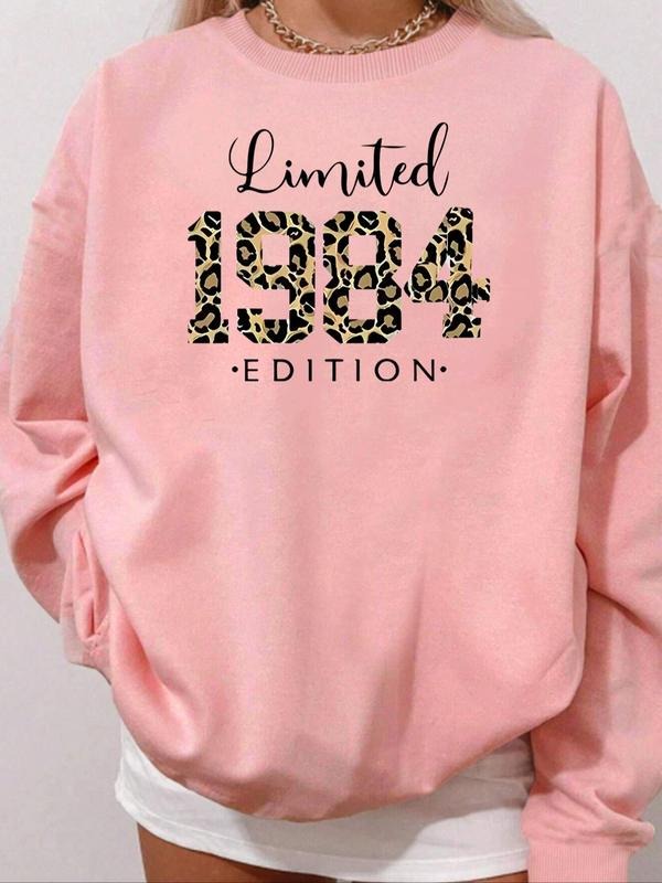 Women'WB shield Leopard Letter Print Round Neck Pullover, Casual Comfortable Drop Shoulder Long Sleeve Crew Neck...