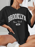 Women'WB shield Letter & Figure Print Drop Shoulder Tee, Casual Half Sleeve Round Neck T-Shirt for Summer, Fashion...