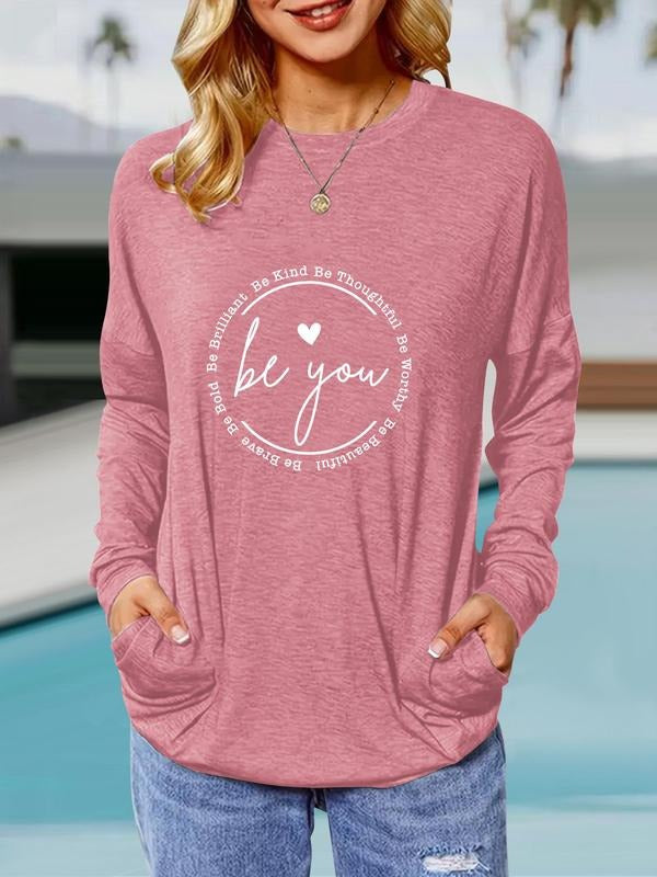 Women'WB shield Letter & Slogan Print Drop Shoulder Tee, Casual Long Sleeve Round Neck Pocket T-shirt for Fall & Winter,...