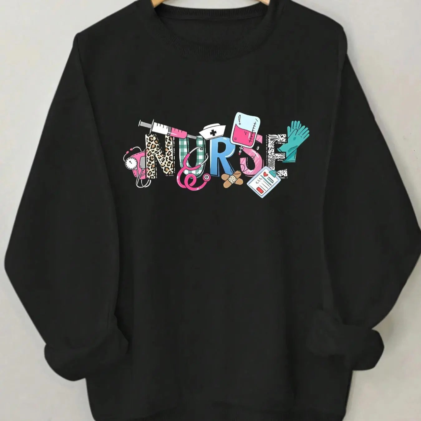 Women'WB shield Nurse Graphic Print Drop Shoulder Sweatshirt, Casual Long Sleeve Round Neck Pullover for Daily Wear,...