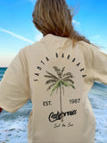Women'WB shield Palm Tree Graphic Print Round Neck Tee, Fashion Casual Drop Shoulder Short Sleeve T-shirt for Daily Wear,...
