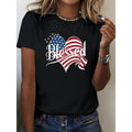 Women'WB shield Patriotic "Blessed" Graphic Tee - American Flag Heart Design, Black Crew Neck Short Sleeve T-Shirt,...