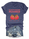 Women'WB shield Peach & Letter Print Round Neck Graphic Tee, Trendy Casual Short Sleeve T-shirt for Daily Wear, Ladies...
