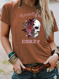 Women'WB shield Rose & Skull Print Round Neck Tee, Fashion Casual Crew Neck T-shirt for Daily Holiday Vacation Outdoor...