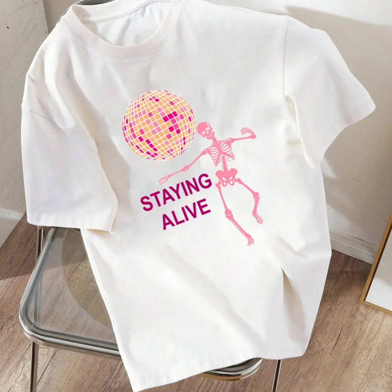 Women'WB shield Skeleton & Letter Print Drop Shoulder Tee, Casual Short Sleeve Round Neck T-shirt for Daily Wear, Ladies...