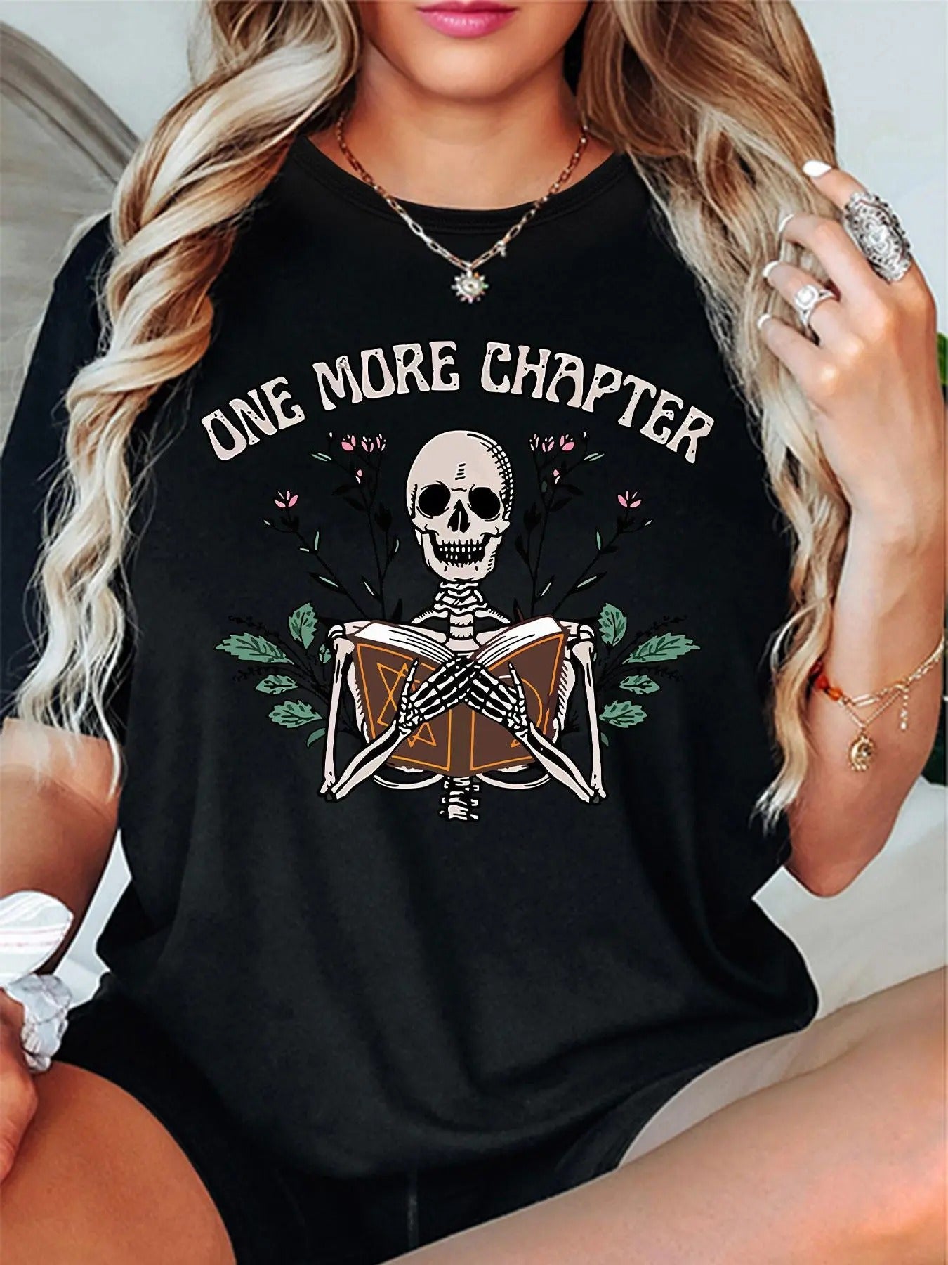Women'WB shield Skeleton & Letter Print Round Neck Tee, Fashion Casual Crew Neck T-shirt for Daily Holiday Vacation...