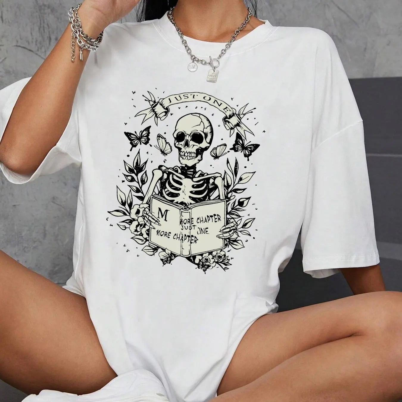 Women'WB shield Skull & Book Print Round Neck Half Sleeve Tee, Fashion Casual Crew Neck Drop Shoulder T-shirt for Daily...
