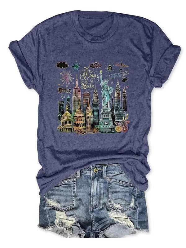 Women'WB shield Statue FOG Liberty & Building Print Round Neck Tee, Casual Letter Graphic Short Sleeve T-shirt, Ladies...