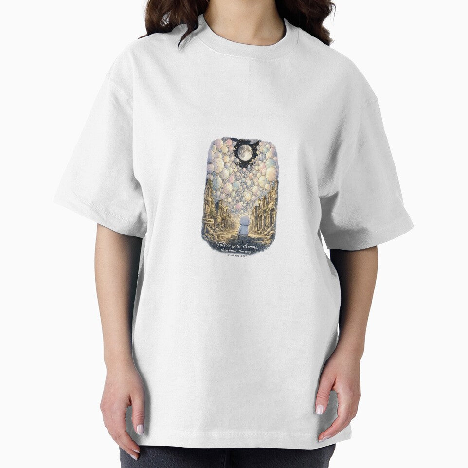 Moonlit Balloon Dreams – A Surreal Street Where Hope Floats Beyond the Ruins Unisex Graphic T-Shirt by #kingMAMECRAFT